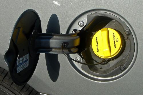 gas filler cap - Typical label and yellow gas cap used American models to identify E-85 flexible-fuel vehicles. Miami, US. Shown a GM Impala. Author Mariordo Mario Roberto Duran Ortiz