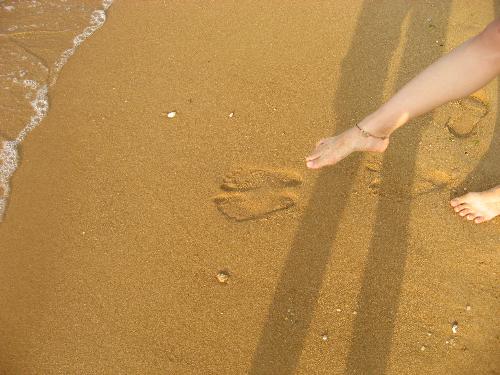 in sunshine -  it is a memorable tourism,the beautiful sea,clean sand,and pretty girl.