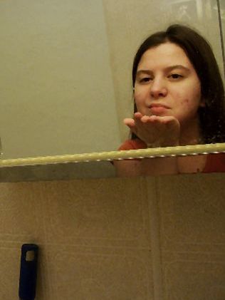 Picture of me - Picture of myself in the mirror of our old house.