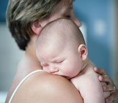 Baby - Baby boy (0-3 months) sleeping on mother s shoulder
