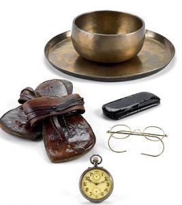 mahatma gandhi items on auction - items formerly owned by Mahatma Gandhi. Mahatma Gandhi's trademark leather sandals and steel-rimmed glasses as well as his watch, will be auctioned in New York next month