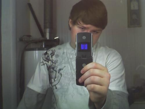 Me again with phone - Me again in this picture