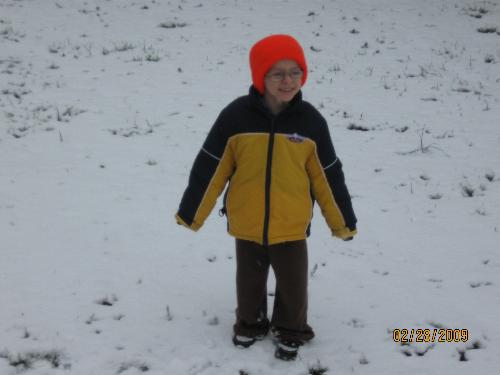 My son enjoying the short lived snow fall - Here in Alabama on March 1,2009. My son out in the snow.