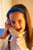 Telephone - Young Girl Talking on the Telephone
