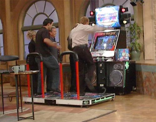 Playing DDR Hardcore - a pic of some people playing Dance Dance Revolution