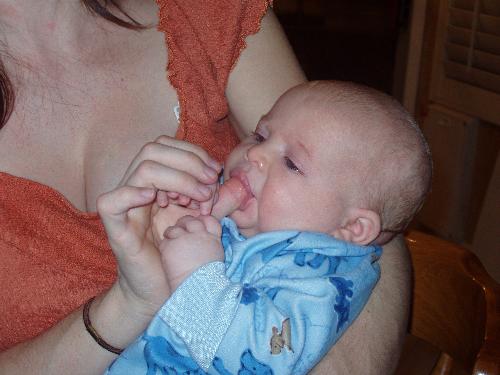 yummy yummy - jake loves to suck on my thumb :) I think it's great that I can keep him occupied rather than trying to feed him all the time. he won't take a binkie though :(