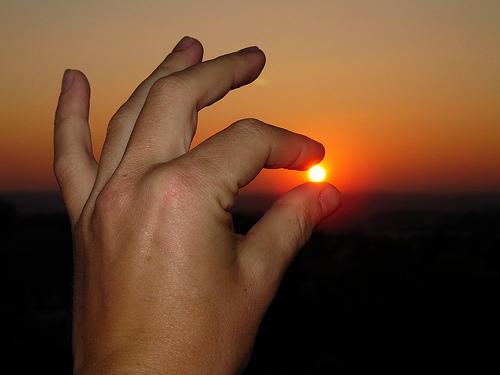 sunset  - have u ever wanted to touch the sun using ur fingertips?