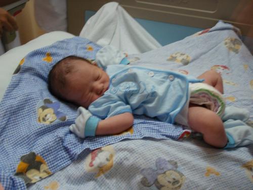Our newborn son Tim Johannes! - Tim Johannes was born on 19th of February 2009 at 2:57 pm in Johor Bahru, Malaysia. His weight was 3.05 kg and his height was 50 cm.  The picture was taken two hours after birth.