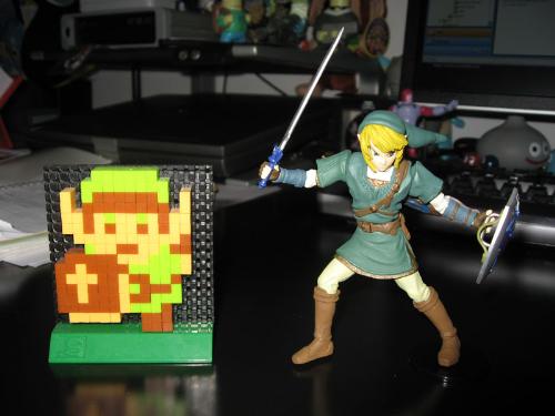 The Legend of Zelda toys - a Link statuette and a cool 8-bit mosaic figure