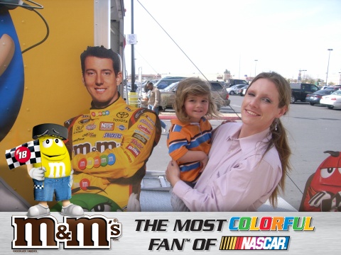 Mom and son.. having fun.. - Picture of me, with son, Zane and a cardboard: Kyle Bucsh, the week he won the Las Vegas NASCAR Race.. This was a promotional freebee offered outside a large retail store, along with the cars on display, in the city.