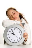 Sleeping - Woman sleeping on a large clock!
