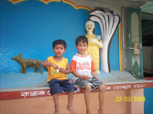 my son and my nephew - On visiting a temple.