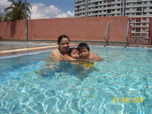 Swimming with my preciouses ... - Heres swimming and bonding with my kids away with my hubby and their dad. Were out of country and dad was back in our hometown. We miss him though but we have to wait for the time we go home.