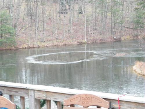 The Ring - My husband took this shot of our lake from our deck. The ice was melting and formed this 'ring' which reminded him of the move called 'The Ring'... kinda spooky! LOL