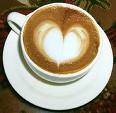 coffee - coffee with a shape of heart in its cream