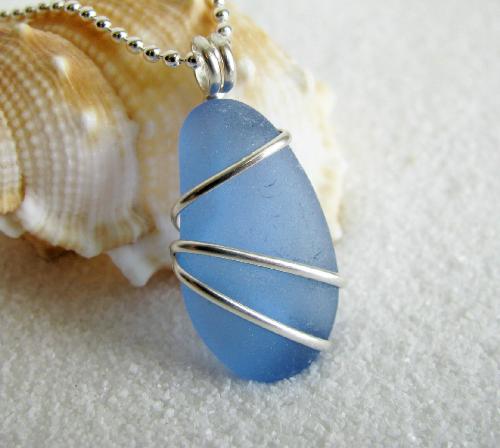 Spring Sky Cornflower Blue Sea Glass Necklace - I haven't had one of these in awhile....  A gorgeous teardrop shaped piece of cornflower blue sea glass (approx 7/8'), is wrapped in sterling silver wire and hangs on an 18' ball-style sterling silver chain.
