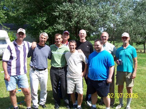 Dettmer 'Boys' at family picnic - This is a photo of my Dad, 5 uncles and 3 cousins at the anual family reunion is Agusta, Wisconsin. Yes, I do have one aunt on my dad's side of the family. I think she's taking the photo. I was off playing horseshoes when this was taken.