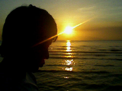 my boyfriend and the sunset - I took this picture when me and my boyfriend was at the beach