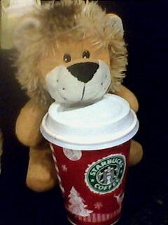 starbucks praline coffee - this is wang wang hugging his praline coffee.. we both love starbucks so much!