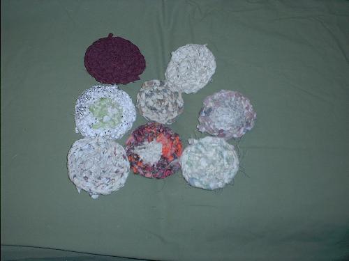 save money use recycled fabric dish scrubbies also - This is a sampling of one of my products here at Mooooshine. I make these from tossed out clothing. they are great for cleaning. but i do have a following of pet lovers who love these as cat and small dog toys since they are washable. I also make rugs, chair pads, hot pads, reusable grocery bags and mini quilts.