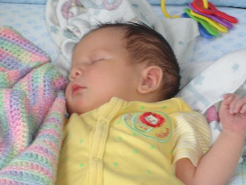 baby sleeping - isn't the baby so cute. looks like a very rested sleep :)