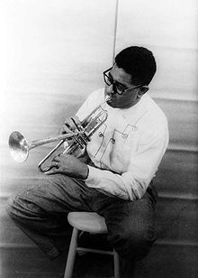 Dizzy playing a Horn - This is a photo of Dizzy Gillespie playing a horn in 1955