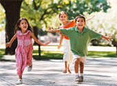 having fun - Group of children having fun in park.
