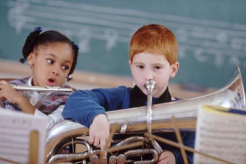kids - Cute kids playing a trombone and a flute.