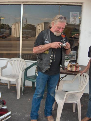 My husband...business owner and biker - My husband and the grand opening of our business.