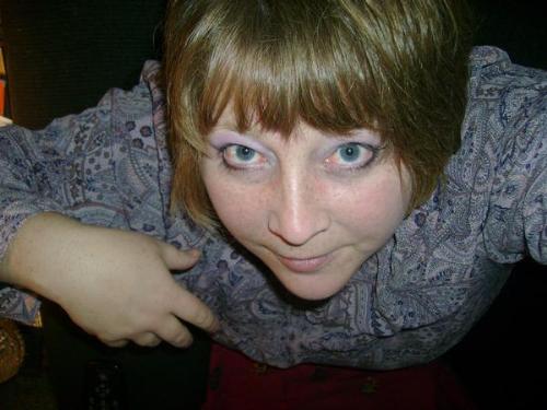 Me - Me...after getting my hair cut and having bangs for the first time in many, many years.