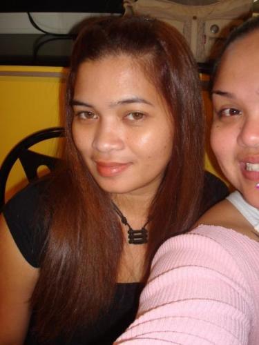 me and my friend that got cut on her face - this was a picture last halloween in Guam premium outlets located in Tamuning Guam... it was me and my friend at work but unluckily her face got cut out from the camera