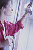 cleaning - Woman Cleaning Window