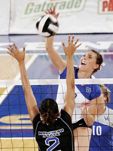 spike! - a girl spiking at the ball.