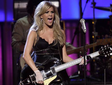 rocking out - carrie underwood rocking out with a guitar