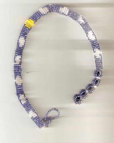 Daytime sky choker - The design for this necklace was inspired by the beautiful blue sky of Maui. It's made with blue white and yellow seed beads using a bead loom.