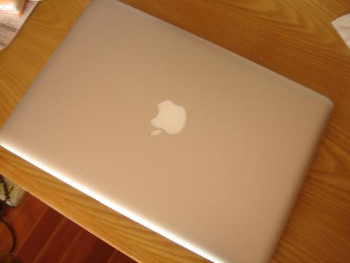 Laptop, my new Macbook - I bought this new macbook in HK when I went there to take my SAT in January, I love Apple!