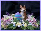 Ostara Altar Decoration - A Bunny, Egg and Spring Flowers all put together in an Ostara Altar Decoration.