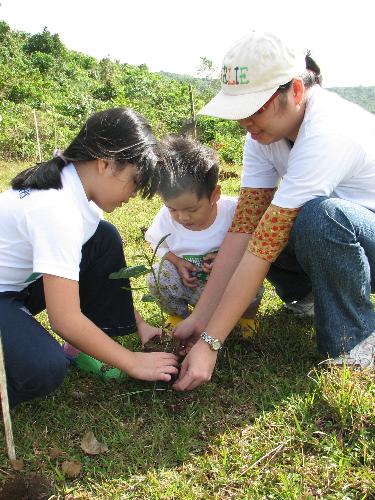 tree planting - tree planting at Caliraya watershed. With me is my son Leon and niece Gayle
