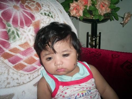 My daughter - Photo was taken while she was sleepy.