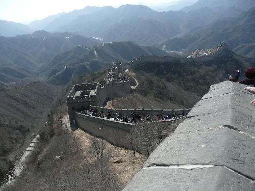 Great Wall - The Great Wall is divided into two sections,the east and west.The most imposing and best preserved sections of the Great Wall are at Badaling and Mutianyu,not far from Beijing and both are open to visitors.