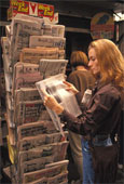 news - Woman At Newsstand