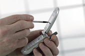 cell - Hand using cell phone/PDA.