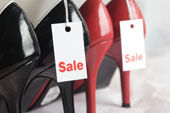 shoes - Two pairs of high heeled shoes, each with a Sale tag on one shoe