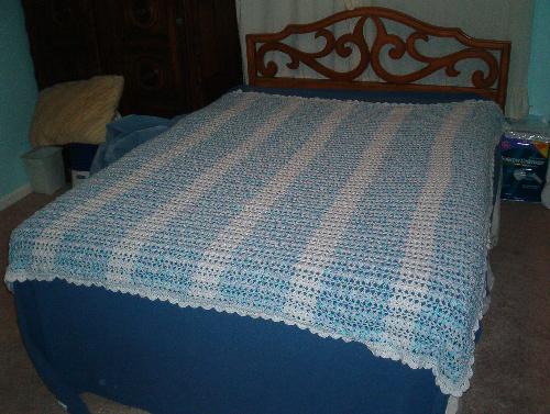 Queen sized topper.  - Just finished this afghan that is the size of the top of a queen sized bed. Whew!! Was I glad when I got through! I kind of made up the pattern as I go along, and I didnt write it down so that will make it a one of a kind!