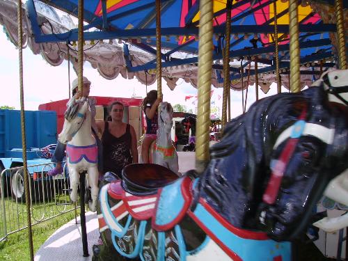 merry go round - my daughter and her friend on the merry go round