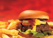 Hamburger - close up of a hamburger served with fries