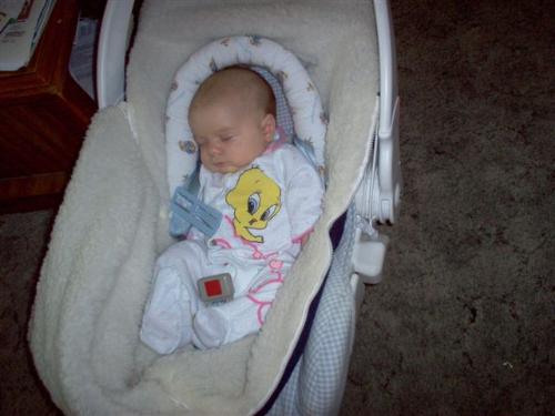 sleeping through the chaos - my daughter can sleep though anything, this was 2 years ago at Easter with my parents, my brother and his three girls, my son and daughter, and my grandpa all running around dyeing easter eggs, and preparing dinner. She just slept right through it. She still sleeps like that.