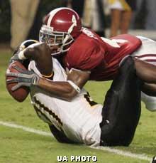 Tyrone Prothro's amazing catch - This was an Alabama receiver named Tyrone Prothro. This catch was the Pontiac game changing performance of the year. It is one of the best catches of all time. Later that season he suffered an injury that ended his football career.