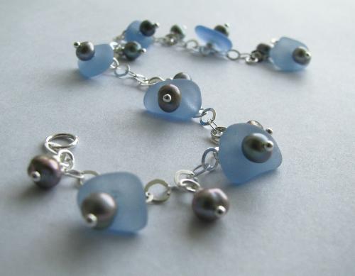 Cornflower Blue Sea Glass Bracelet - This sterling silver bracelet, adorned with cornflower blue sea glass is not yet in my Etsy shop....but it will be soon! This is my first sterling silver bracelet. Every component with the exception of the authentic sea glass and the shell beads are all .925 sterling silver and the bracelet measures 7 1/2 in length.