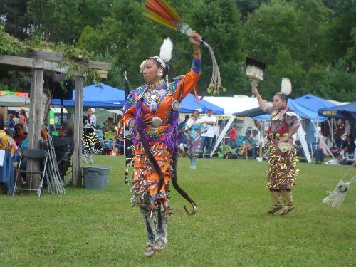 Pow Wow Dancing - These are dancers under the sun dancing too the sounds of the drum and the singing of other tribes and families at the annual Pow Wow. Pow Wow Dancing - These are dancers under the sun dancing too the sounds of the drum and the singing of other tribes and families at the annual Pow Wow.